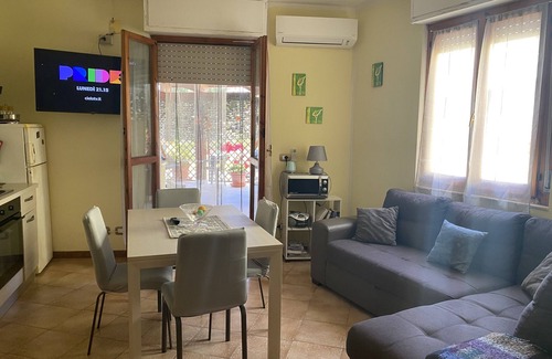 La Taulera Apartment | Alghero, Spiagge Bianca Maria Pia, beautiful veranda with outdoor kitchen