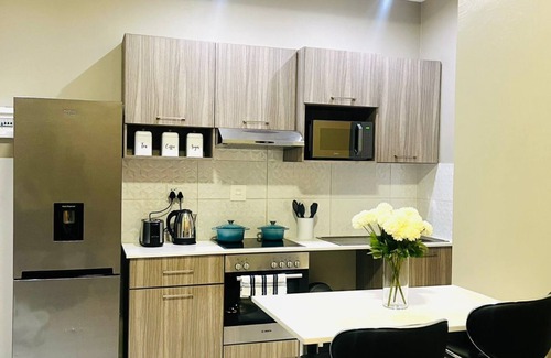 Greater Johannesburg Metropolitan Area Condo | Alice's Place -Power Back Up- Pool & Cinema & More in vibrant Johannesburg