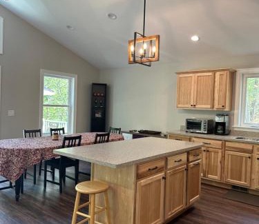Great Cacapon House | All Decked Up - wifi, view, river access, fire pit, 3 bedrooms, games, family friendly