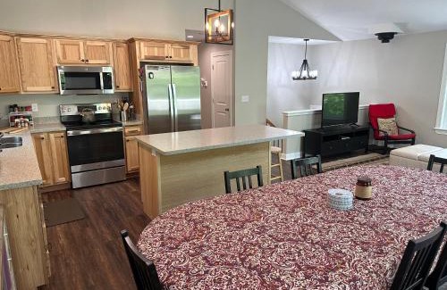Great Cacapon House | All Decked Up - wifi, view, river access, fire pit, 3 bedrooms, games, family friendly