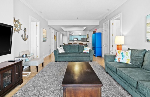 Long Beach Condo | All-suite condo with Gulf views, beach access, balcony, pool, spa, gym, & AC