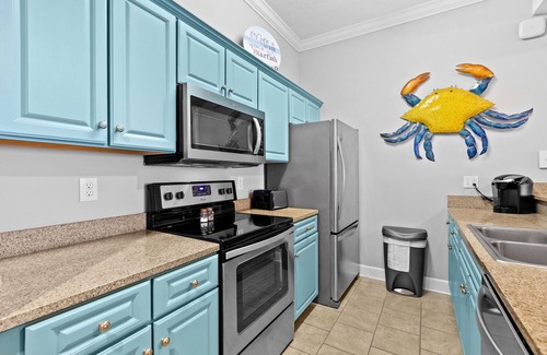 Long Beach Condo | All-suite condo with Gulf views, beach access, balcony, pool, spa, gym, & AC