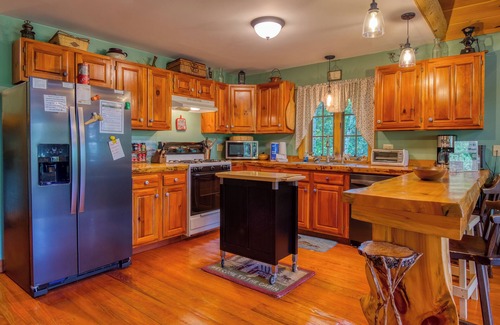 Rangeley House | Alpine Loon Lodge - Just a mile from downtown Rangeley with lake views!