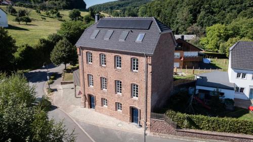 Baustert Apartment | Alte Schule - Modern Wohnen in historischen Altbau