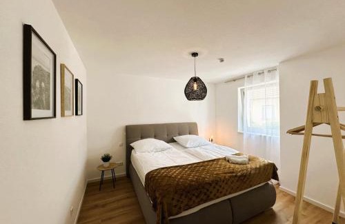 Elgersweier Apartment | AMAO Indigo - Rollstuhlgerechte Suite - 62 qm - Balkon & Tiefgarage - Aufzug - Kingsize-Bett - Nähe Messelevator