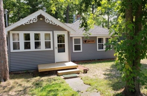 Higgins Lake Cabin | Amazing Cabin directly on Higgins Lake w/Private Boat Mooring Onsite!