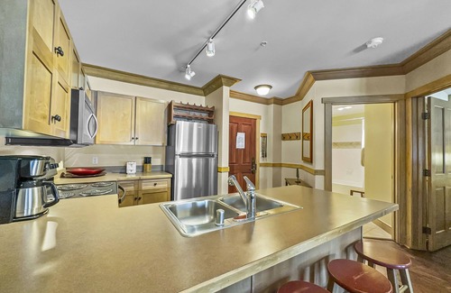 East Village at Copper Condo | Amazing Condo With walk out porch! Two Hot Tubs! CS129