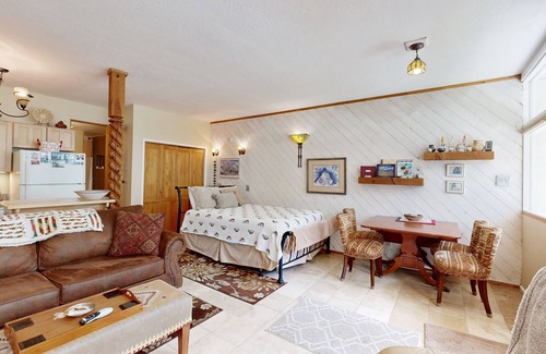 Taos Ski Valley Condo | Amazing condo with river & mountain views, hot tub, & wood-burning fireplace