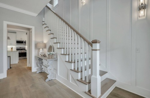 Saint Simons Island House | Amazing Island Oasis, Heated Pool, Outdoor Bar Area with TV, Bocce Ball Court & Putting Green
