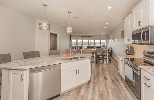 Arnolds Park Condo | Amazing Lakefront 4 bedroom luxury Condo with large deck at Bridges Bay Resort.
