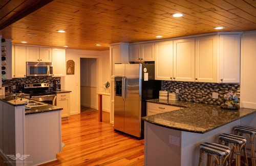 Pigeon House | Amazing North Shore Sandy Beach Front Home!