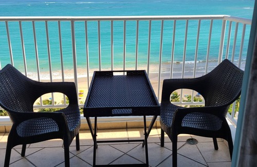 Isla Verde Condo | Amazing Ocean View! 5 min. to the airport, Street walk to hotels, casinos, rest.