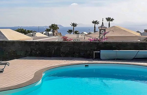 Playa Blanca Villa | Amazing sea and mountain views, heated pool and jacuzzi, airconditionn