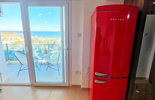 Trikomo Apartment | Amazing sea view studio with pool - steps away sandy beach