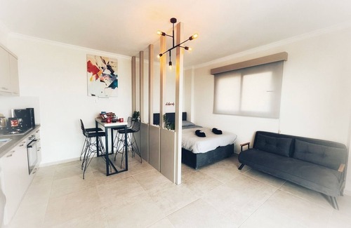 Trikomo Apartment | Amazing sea view studio with pool - steps away sandy beach