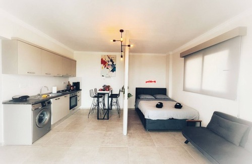 Trikomo Apartment | Amazing sea view studio with pool - steps away sandy beach