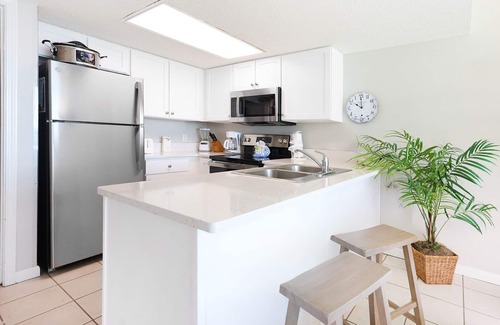 Gulf Shores Condo | AMAZING SUNRISE VIEW! Full Kitchen & Living Room! Corner Unit!