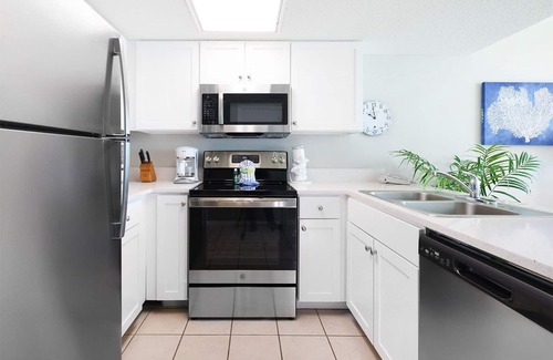 Gulf Shores Condo | AMAZING SUNRISE VIEW! Full Kitchen & Living Room! Corner Unit!