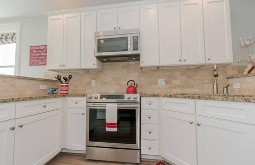 Galveston Condo | Amazing view of San Luis Pass and directly viewing the Sunset Pool/Lazy River!