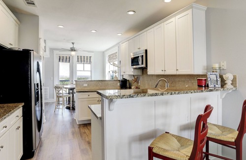 Galveston Condo | Amazing view of San Luis Pass and directly viewing the Sunset Pool/Lazy River!