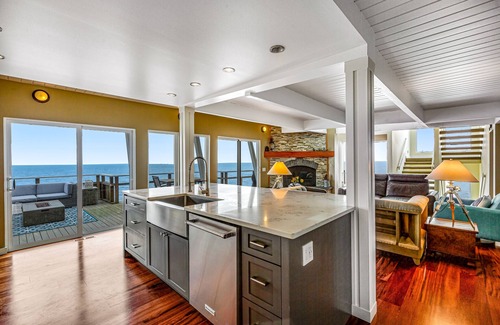 Rollingbay House | Amazing waterfront home with a fireplace, game room, fast WiFi, & washer/dryer