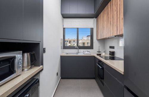 Universal Apartment | Amber Suites – Suite with Private Balcony