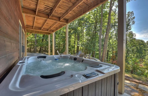 Talking Rock Cabin | Amber Sunsets dazzles with panoramic views, hot tub luxury, a custom firepit, screened porch, pool table, and pet-friendly hospitality!