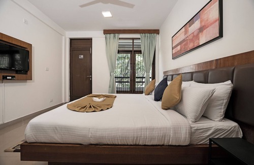 Indiranagar Hotel | Amor Mystic Inn