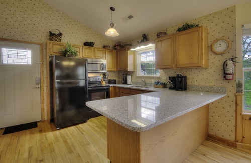 Pigeon Forge Cabin | Amy's Waterfront Blessing w/Hot Tub, Arcade , & Fishing 2 King Master Suites