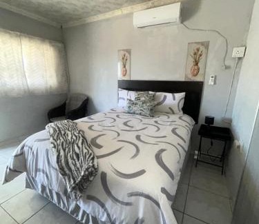 Moses Kotane Apartment | Amza guest room