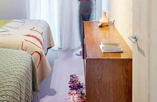 Varsenare House | An Architectural Home with Panoramic Views, Color Accents, and a Warm Design.