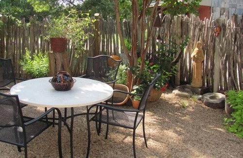 Fredericksburg House | An art filled, 120 year old limestone house, 4 blocks from Main St.