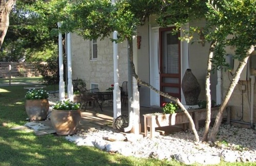 Fredericksburg House | An art filled, 120 year old limestone house, 4 blocks from Main St.