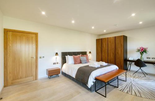 Crianlarich Ski Chalet | An Caisteal Lodge with cascading waterfall view