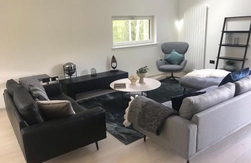 Crianlarich Ski Chalet | An Caisteal Lodge with cascading waterfall view