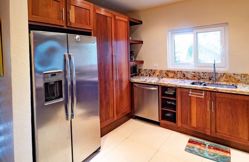 Antoneys Cay Condo | An Oasis in West End: Waterfront with Pool and Dock