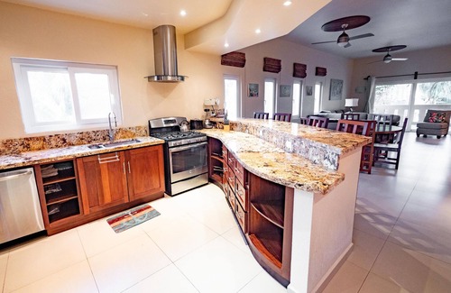 Antoneys Cay Condo | An Oasis in West End: Waterfront with Pool and Dock
