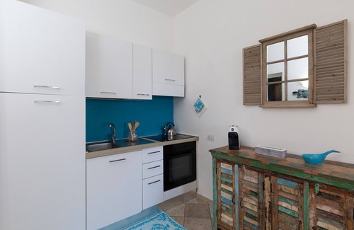Pittulongu Apartment | Anemone Apartment with Terrace by Wonderful Italy
