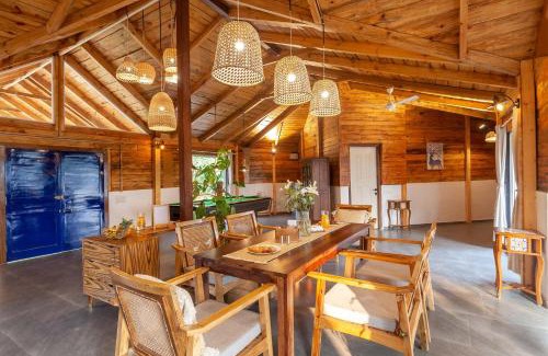 Karjat Villa | Anjee's Chalet by StayVista - Mountain-view villa with Classic wooden interiors, Lush lawn & Snooker table
