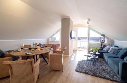 Spiekeroog Apartment | Antares Spiekerooger Gästehaus-Penthouse mit Blick aufs Wattenmeer - Wohnung 9