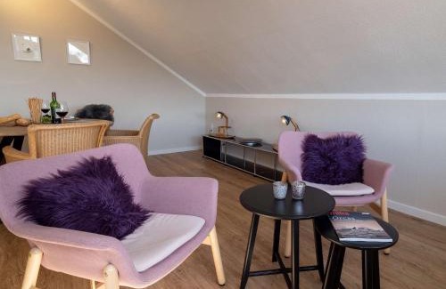 Spiekeroog Apartment | Antares Spiekerooger Gästehaus-Penthouse mit Blick aufs Wattenmeer - Wohnung 9