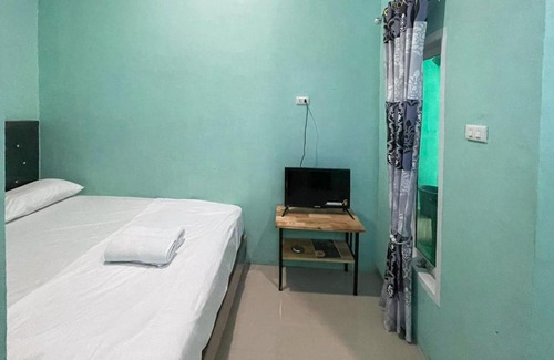 Ambarita Hotel | Antony Homestay near Pantai Pasir Putih Parbaba Mitra RedDoorz