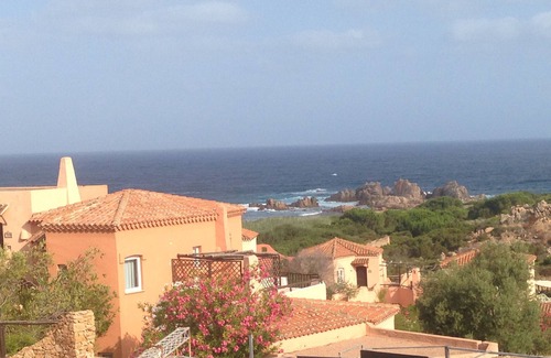 Trinita d'Agultu e Vignola Apartment | apartment in villa facing the sea terrace on the sunset