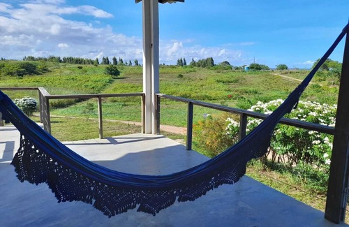 Barra de Santo Antonio Apartment | Apartamento arejado na Ecofazenda Caúna, com vista para o mar da Ilha da Croa
