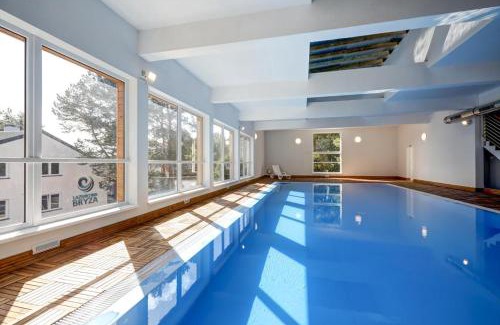 Poddabie Apartment | Apartament 3B Niebieskie Apartamenty Poddąbie dawniej Blue Marine z basenem krytym, odkrytym, salą zabaw, animacjami