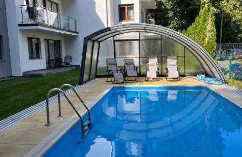 Jastrzebia Gora Apartment | Apartament z ogródkiem, basen, garaż, rowery Willa 4 Pory Roku