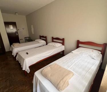 Patos de Minas Apartment | Apartamento 105 - Suíte em região central com ventilador