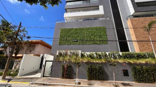 Ponta da Praia Apartment | Apartamentos na Ponta da Praia Housi by Book Santos