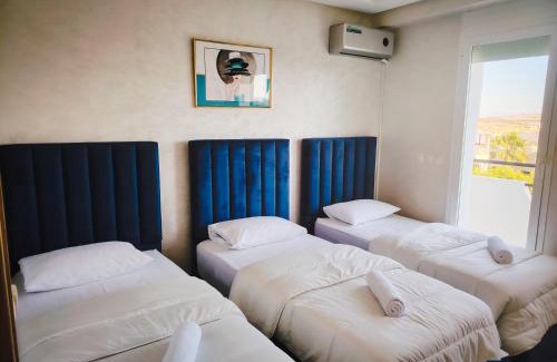 Achakkar Apartment | Apartement de Luxe - climatisé sur la plage de Achakar complexe avec piscine