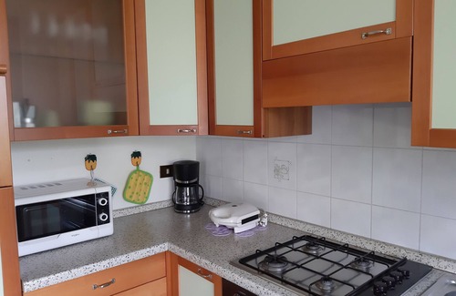 Assenza Apartment | Apartment Agnese with lake view, swimming pool, garage and private garden.